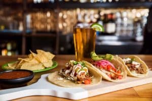 Tacos, beer and chips from Paco's Tacos and Tequila in Charlotte