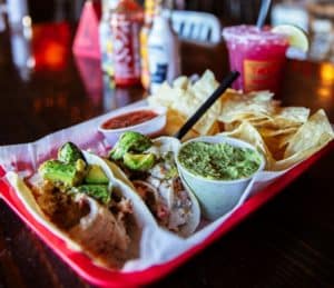 Tacos, chips, and sauces from Taco Mama in Charlotte